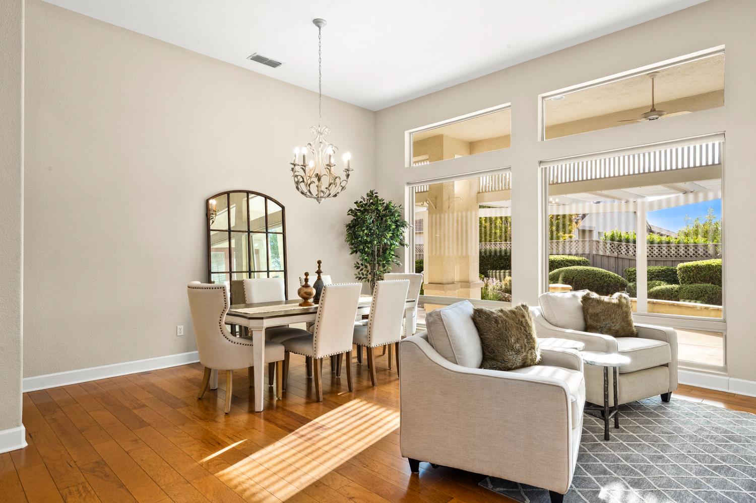 856 Mossy Ridge Lane Lincoln, CA 95648 - Photo 8 of 44 a living room with furniture a table and a large window