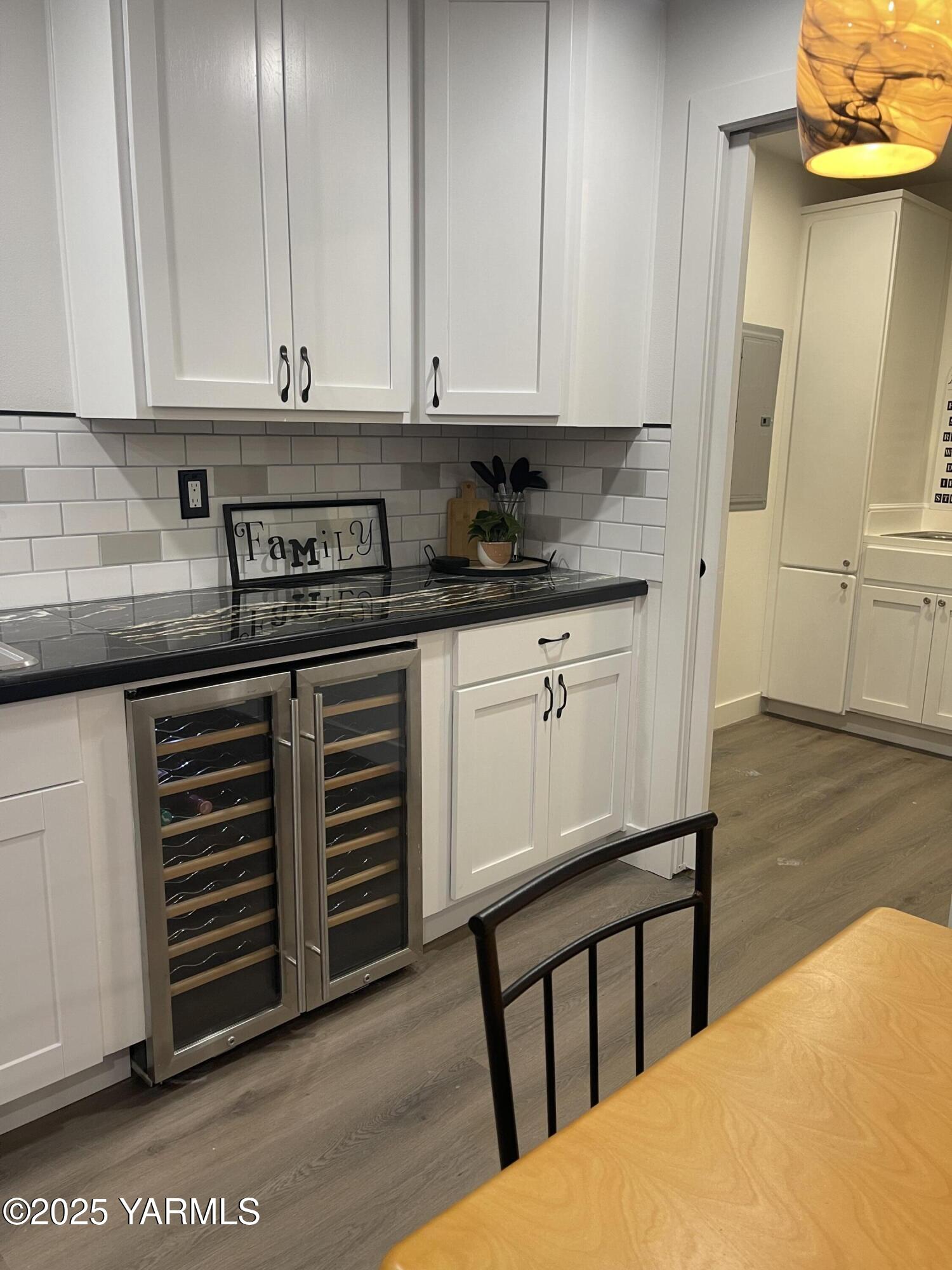 212 West Boulevard, Unit S Granger, WA 98932 - Photo 16 of 40 a kitchen with stainless steel appliances granite countertop a sink and cabinets