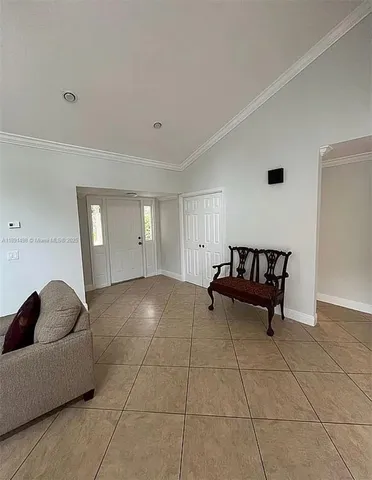 a view of livingroom with furniture and window