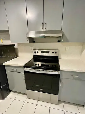a sink sitting in a bathroom next to a window