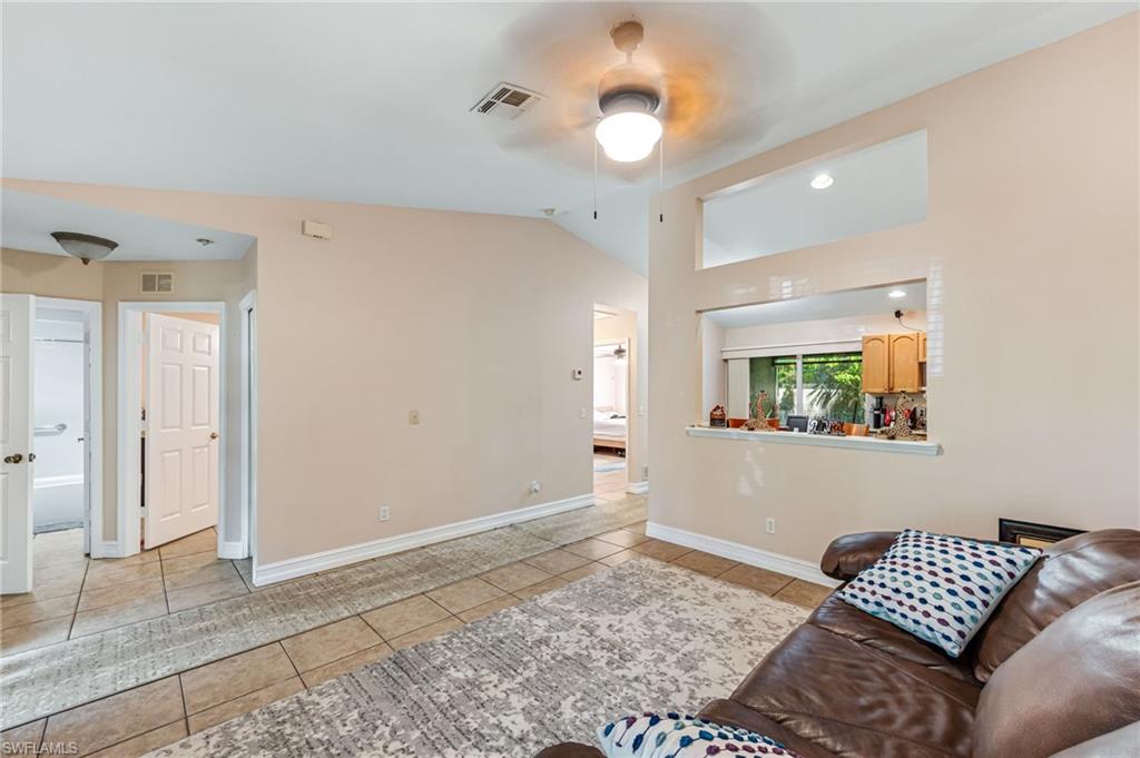 724 Pine Cone Lane Naples, FL 34104 - Photo 24 of 45 a view of room with furniture and ceiling fan