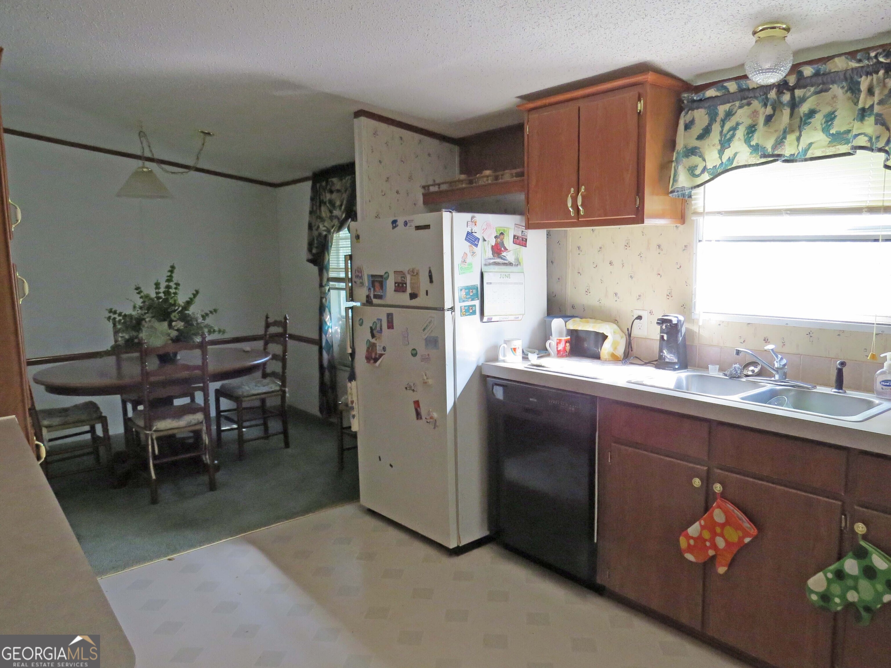 241 Mount Galilee Church Road Jacksonville, GA 31544 - Photo 5 of 19 a kitchen with a sink and cabinets