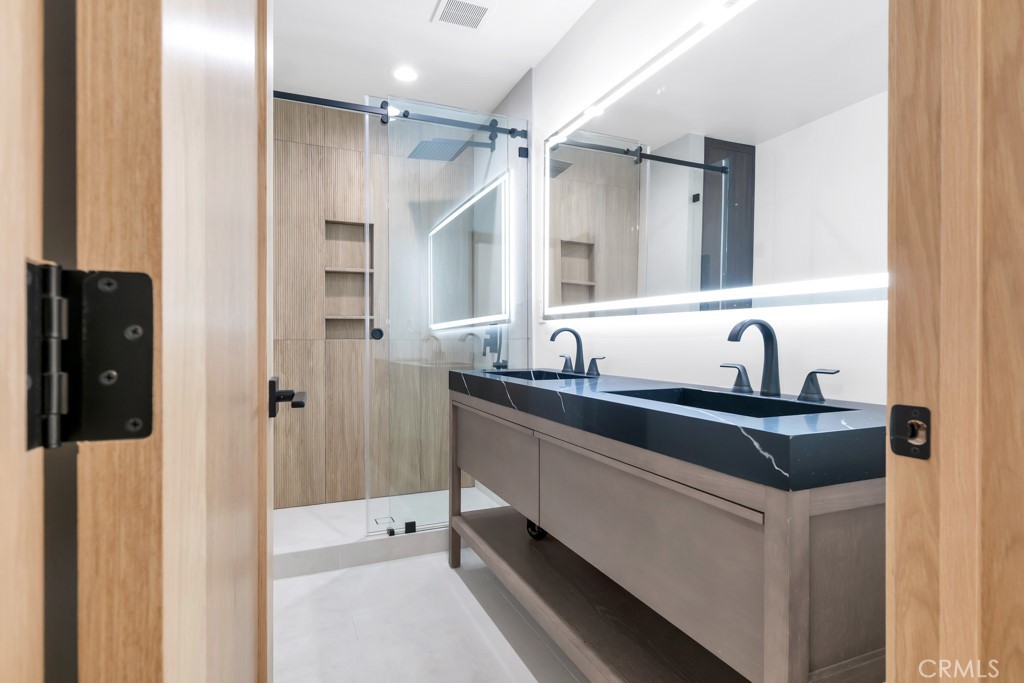 6156 Colbath Avenue Valley Glen, CA 91401 - Photo 18 of 62 a kitchen with a sink and a refrigerator