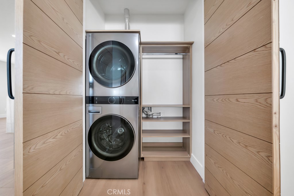 6156 Colbath Avenue Valley Glen, CA 91401 - Photo 23 of 62 a view of washer and dryer in a utility room