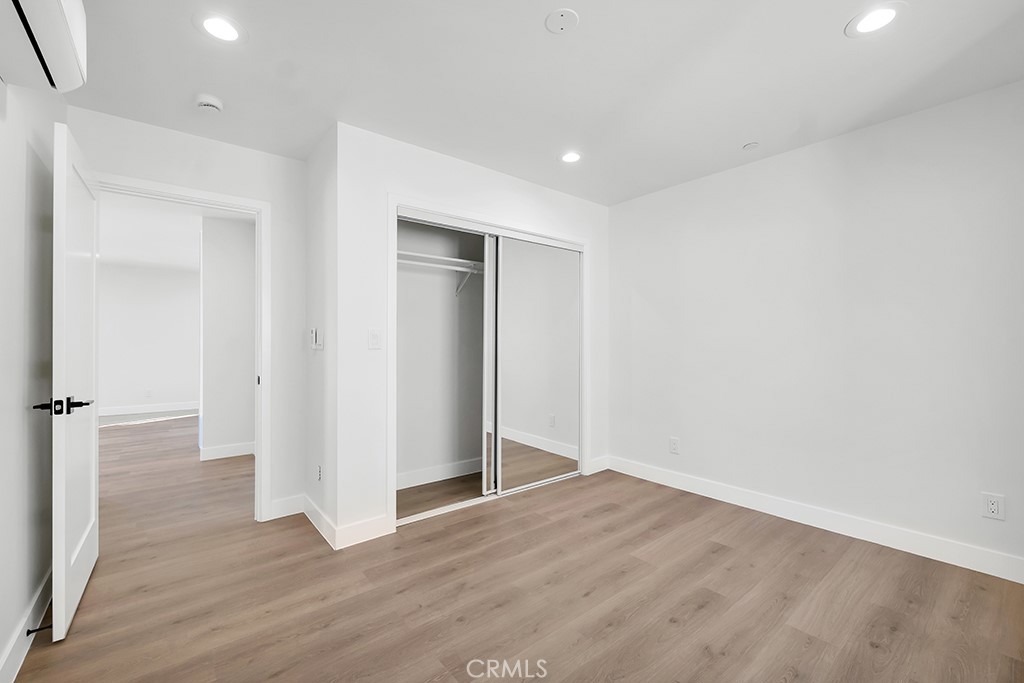 6156 Colbath Avenue Valley Glen, CA 91401 - Photo 37 of 62 a view of empty room with wooden floor