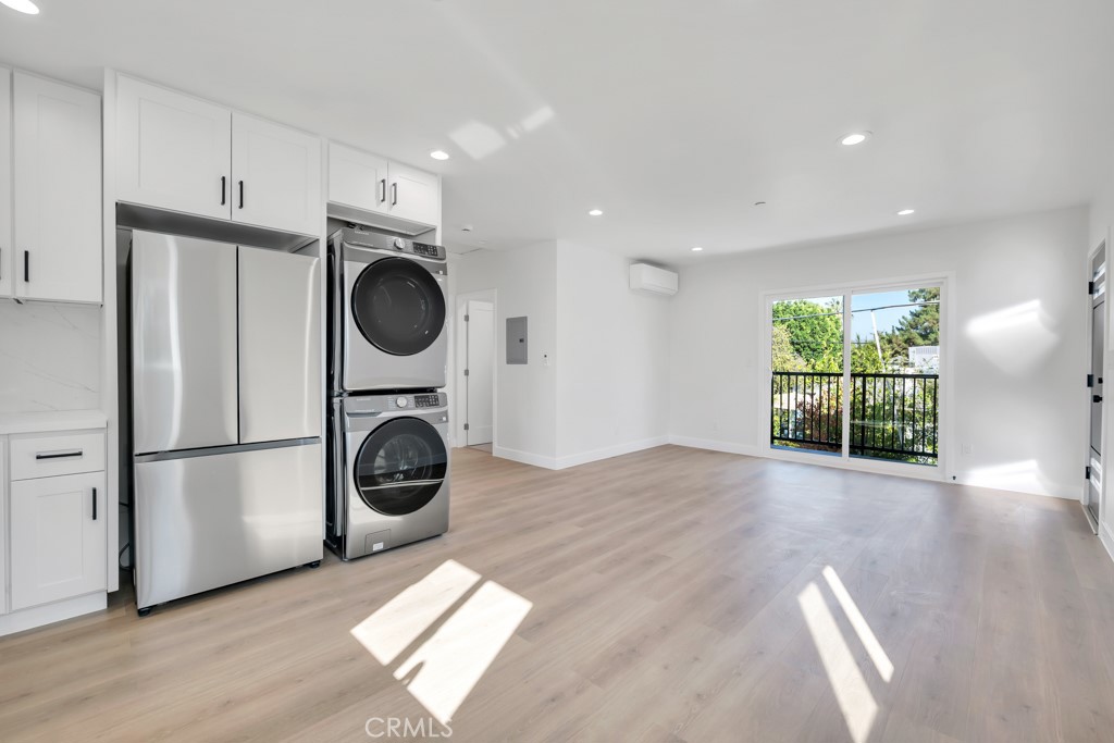6156 Colbath Avenue Valley Glen, CA 91401 - Photo 41 of 62 a view of a storage & utility room with washer and dryer