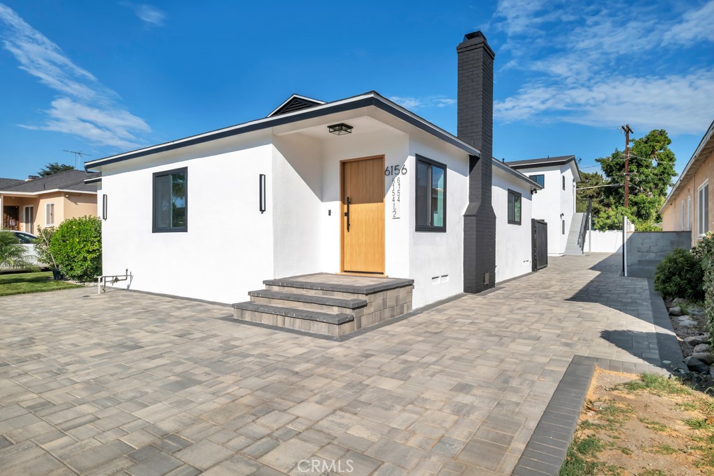 6156 Colbath Avenue Valley Glen, CA 91401 - Photo 49 of 62 a view of a house with a snow in the yard