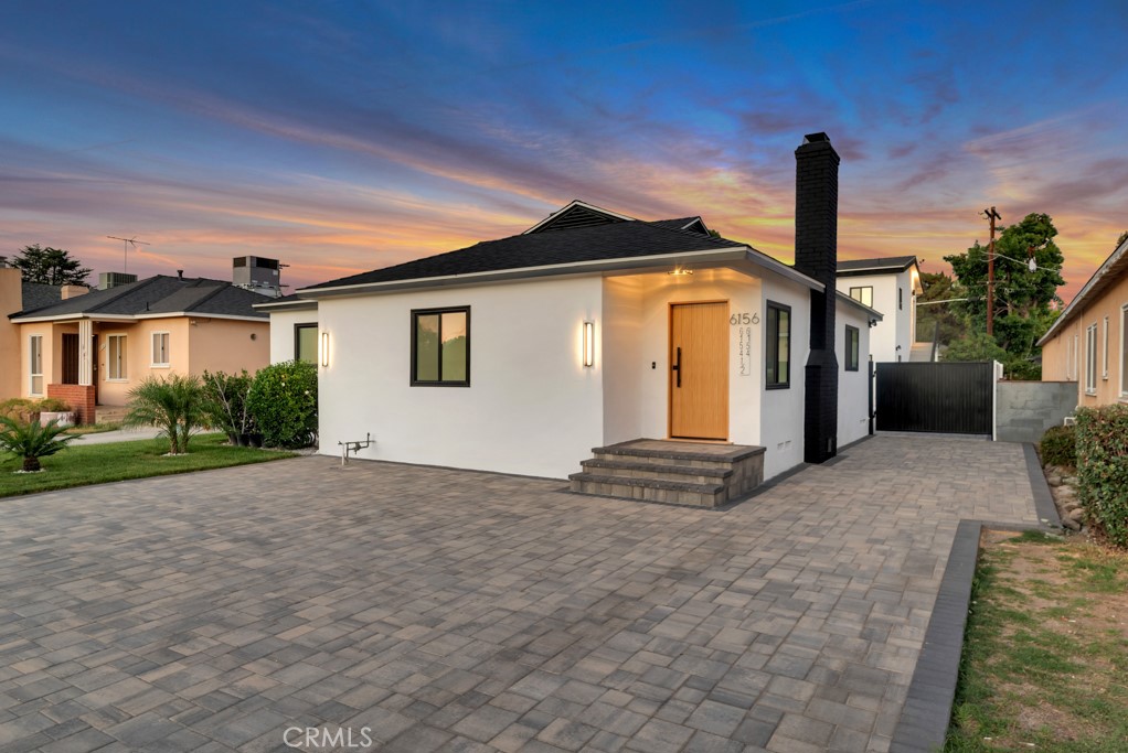 6156 Colbath Avenue Valley Glen, CA 91401 - Photo 51 of 62 a view of a house with a yard and plants