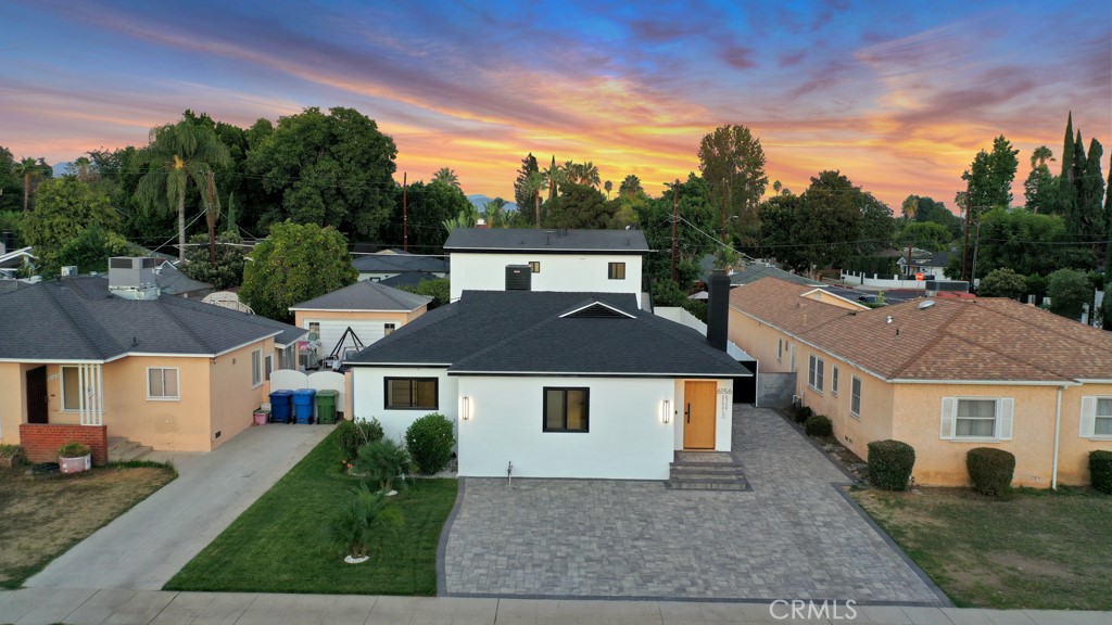 6156 Colbath Avenue Valley Glen, CA 91401 - Photo 55 of 62 a front view of a house with a yard