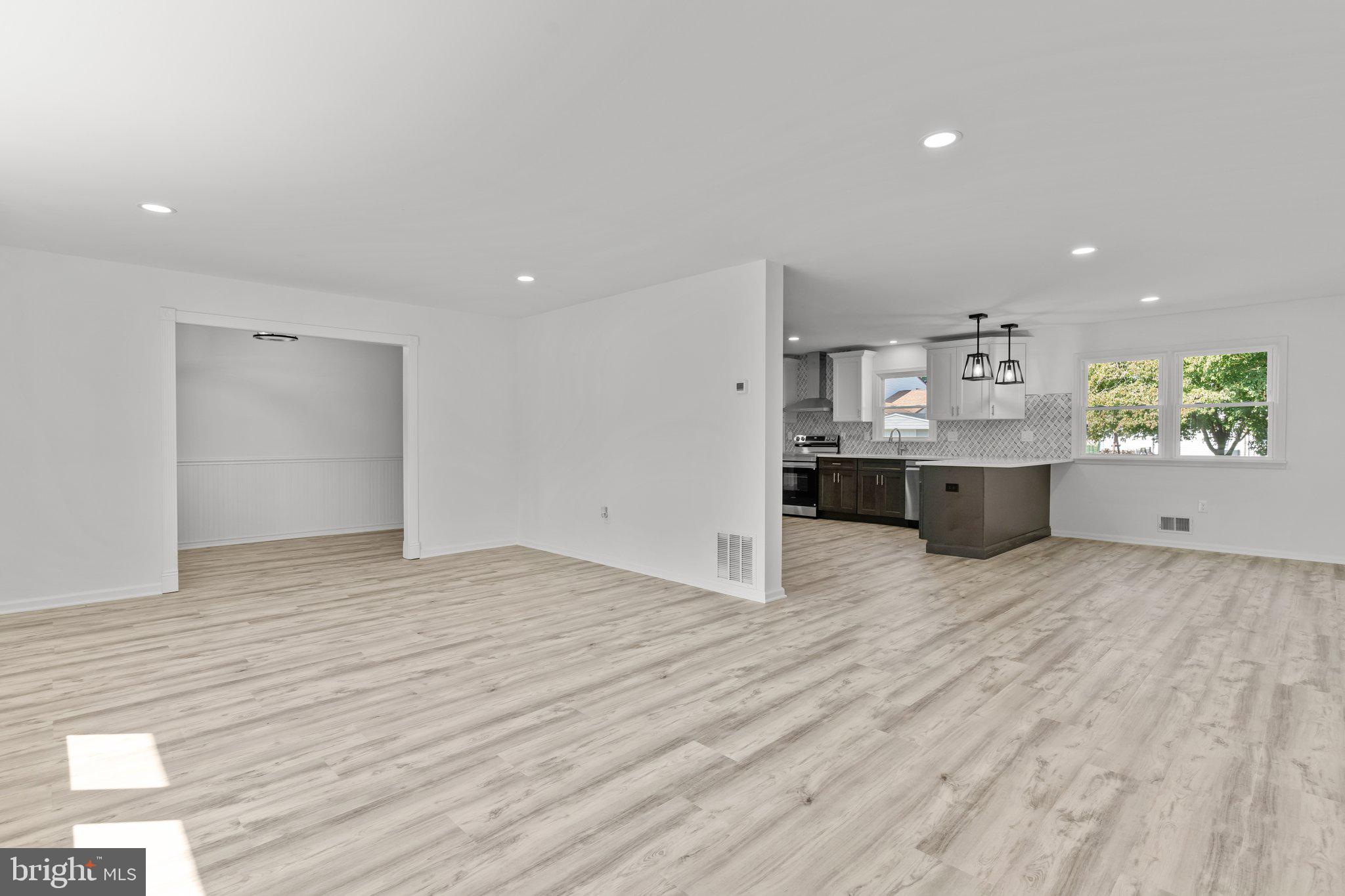 8 Robin Hood Drive Levittown, PA 19054 - Photo 8 of 49 Living Room into Dining Room