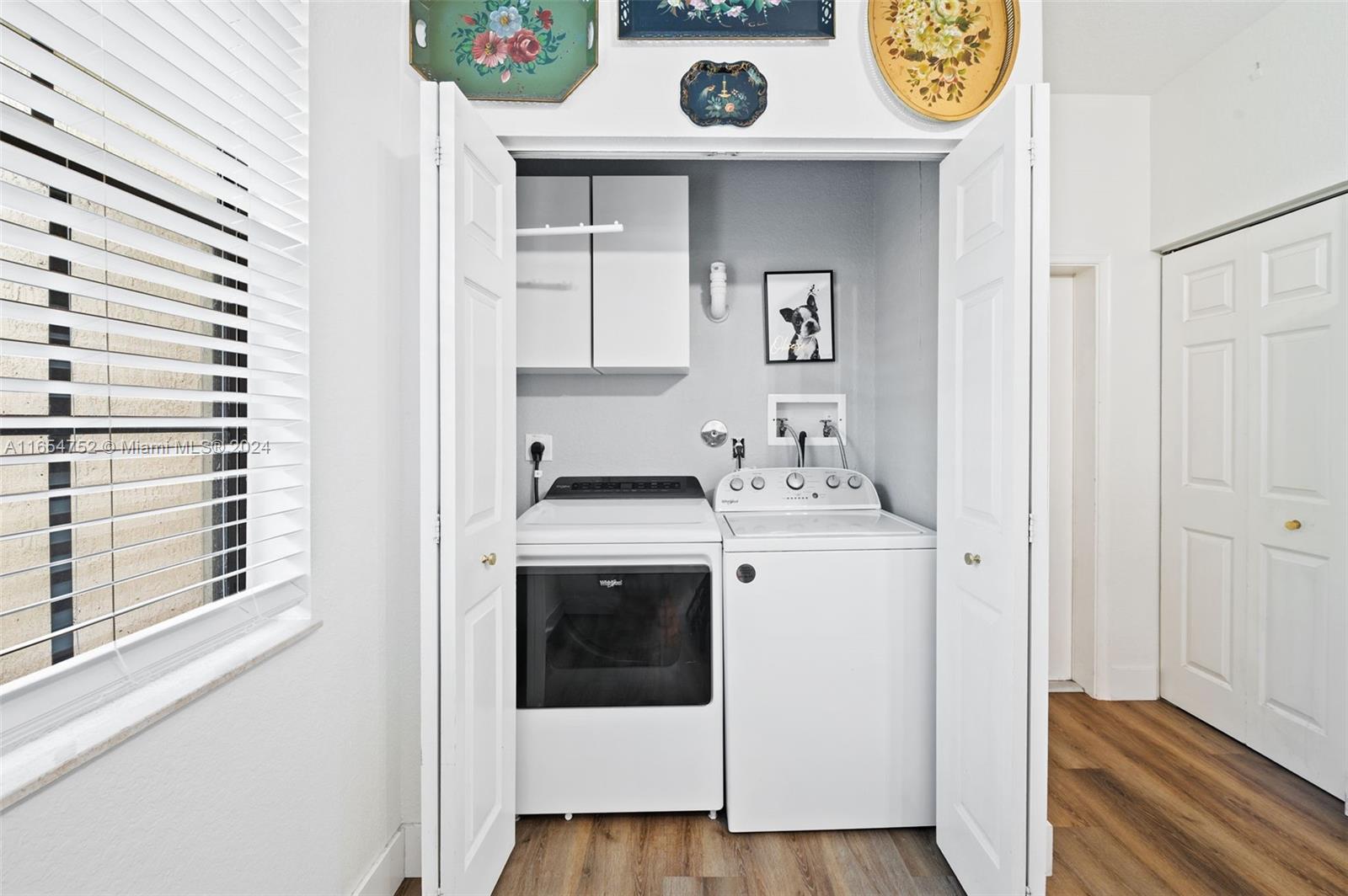 3822 Tree Top Drive Weston, FL 33332 - Photo 15 of 37 a utility room with dryer and washer