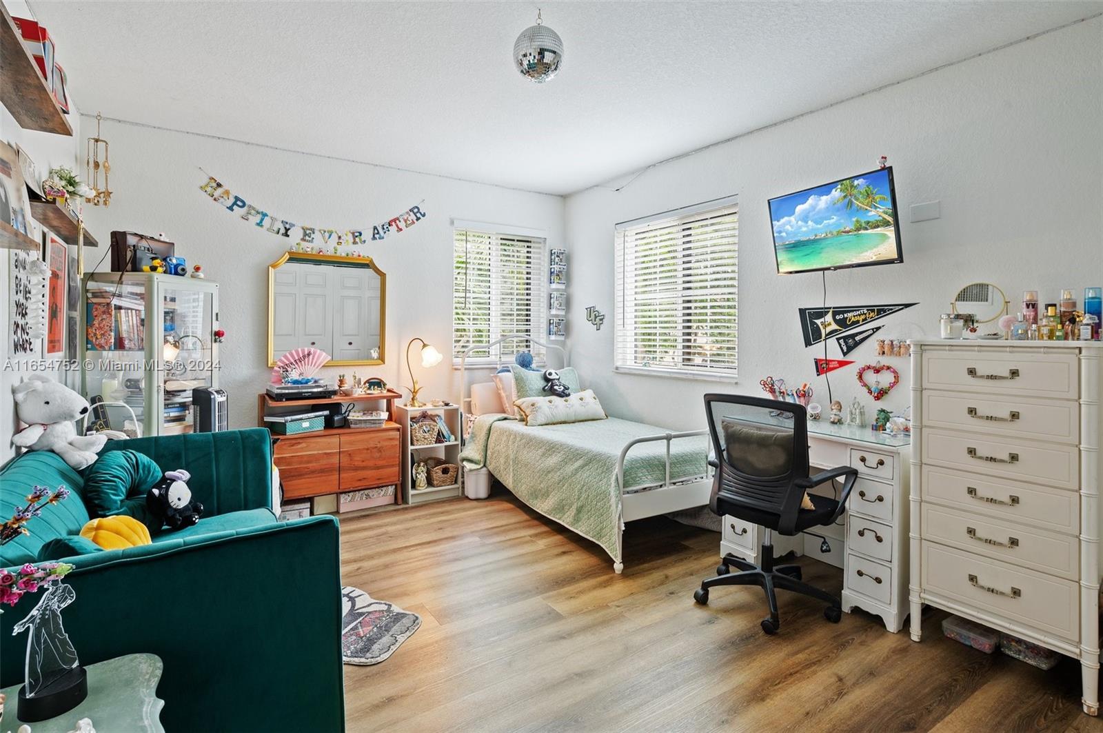 3822 Tree Top Drive Weston, FL 33332 - Photo 21 of 37 a livingroom with workspace and a window