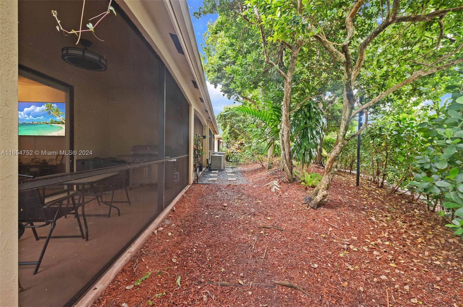 3822 Tree Top Drive Weston, FL 33332 - Photo 30 of 37 a view of outdoor space and deck