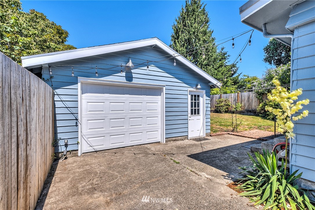 2216 Northeast 8th Place Renton, WA 98056 - Photo 2 of 24 a view of a house with a garage