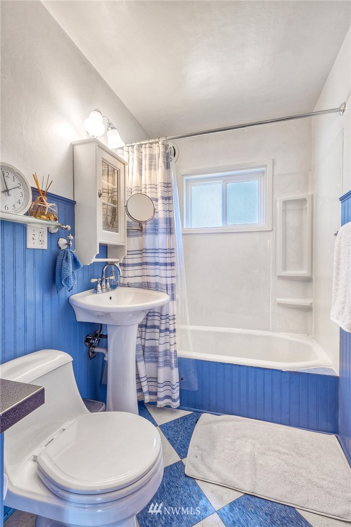 2216 Northeast 8th Place Renton, WA 98056 - Photo 18 of 24 a bathroom with a sink and a mirror