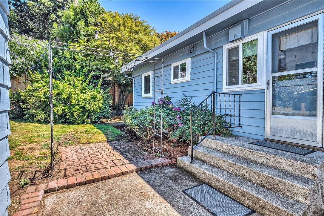2216 Northeast 8th Place Renton, WA 98056 - Photo 24 of 24 a view of a backyard with potted plants