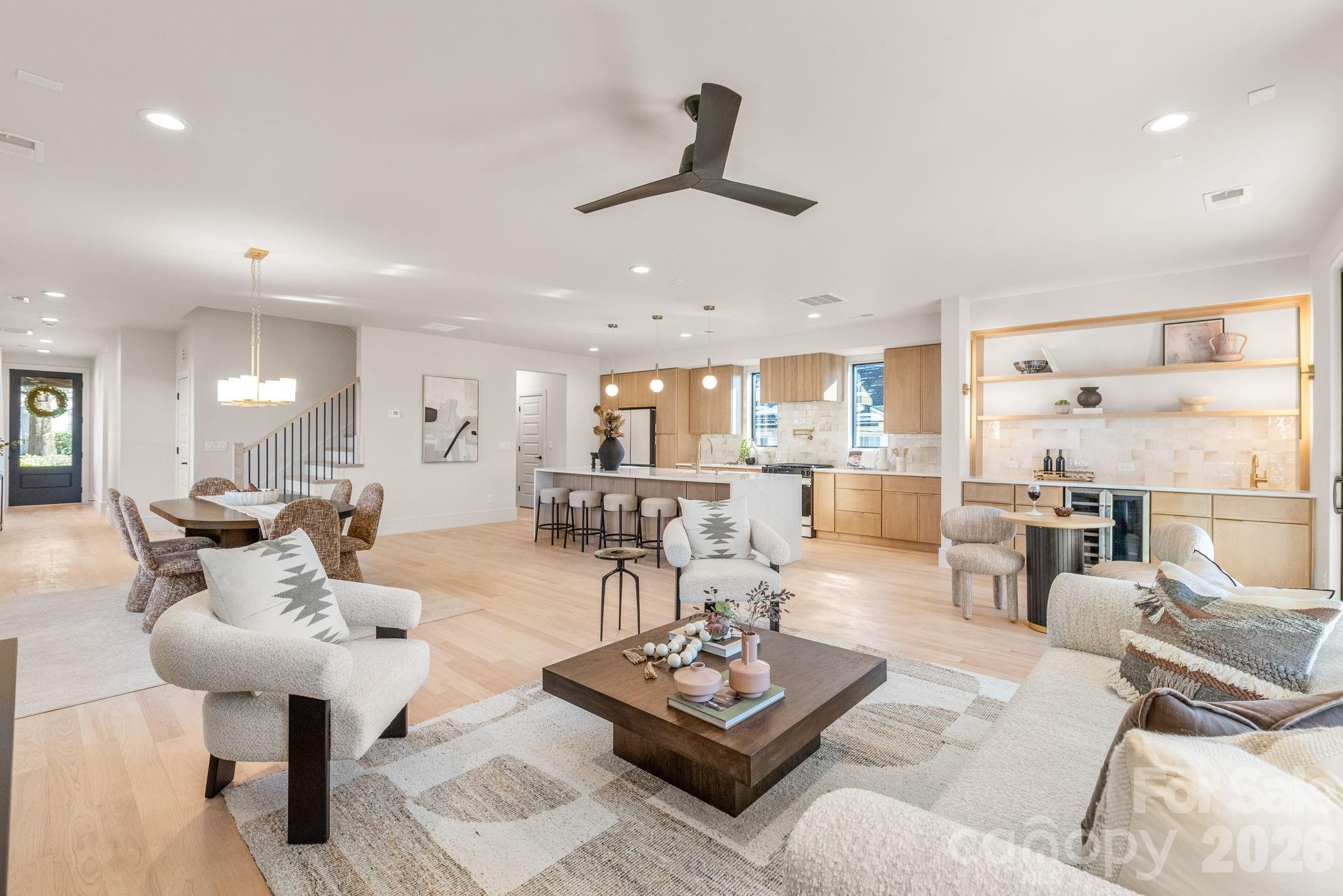 1637 Umstead Street Charlotte, NC 28205 - Photo 19 of 48 a living room with furniture and a view of kitchen