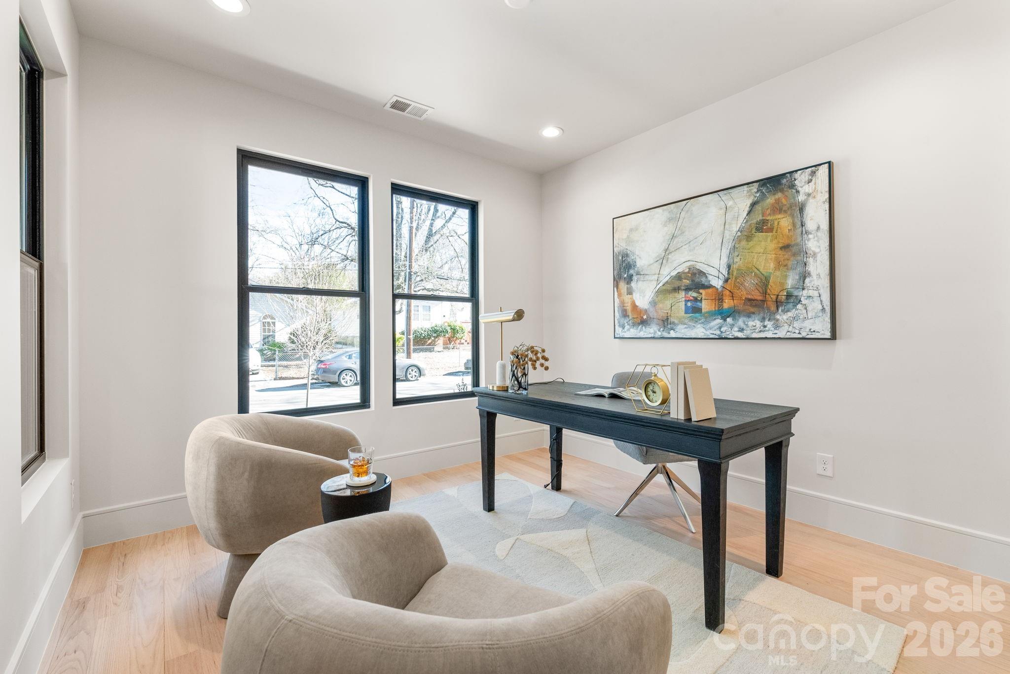 1637 Umstead Street Charlotte, NC 28205 - Photo 25 of 48 a living room with furniture and a window