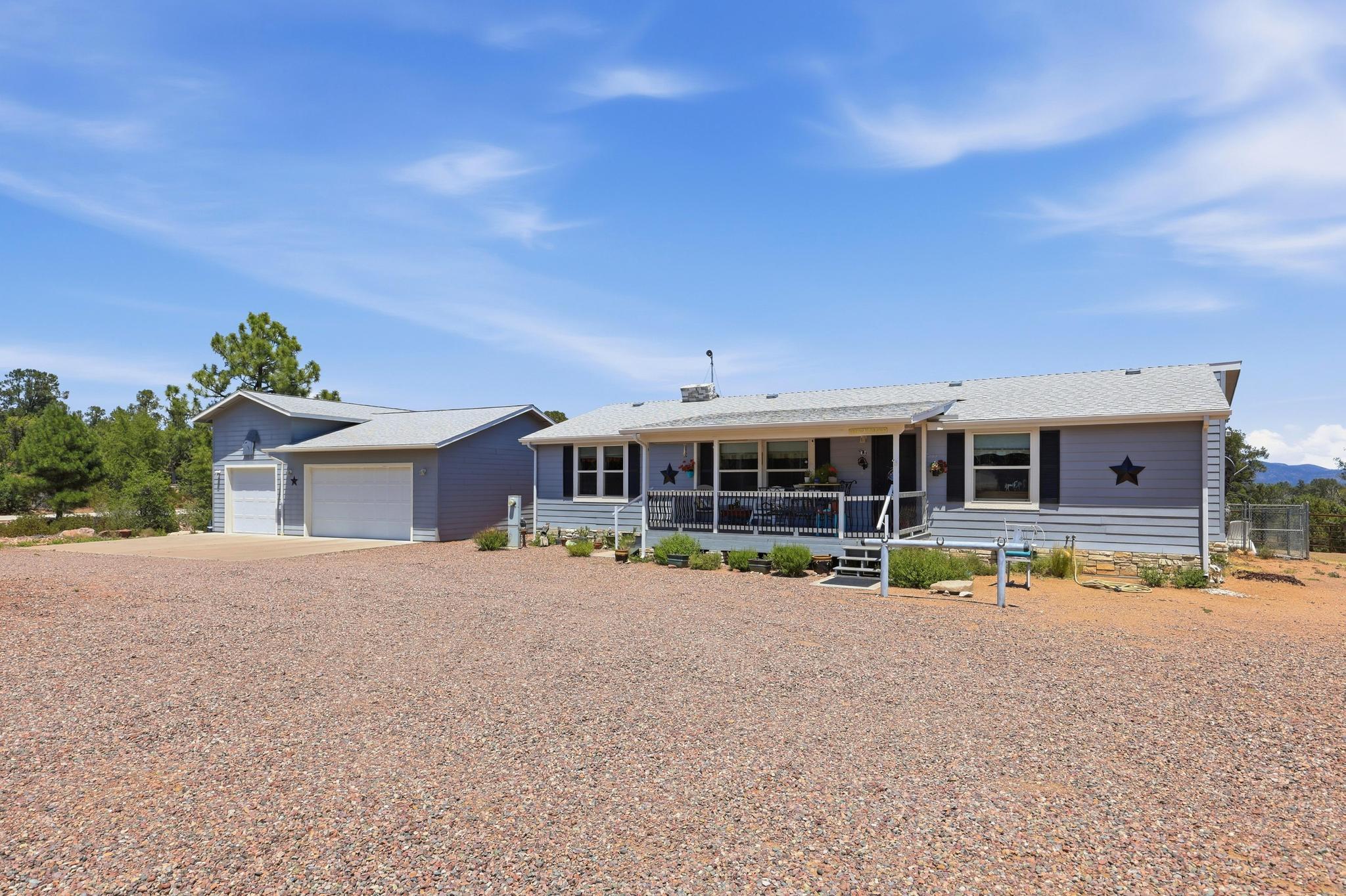 1211 Heather Circle Payson, AZ 85541 - Photo 29 of 51 a view of a house with pool and chairs