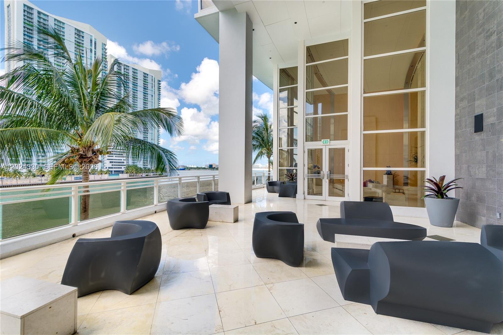 901 Brickell Key Boulevard, Unit 2006 Miami, FL 33131 - Photo 33 of 41 Building Terrace Overlooking the Miami River