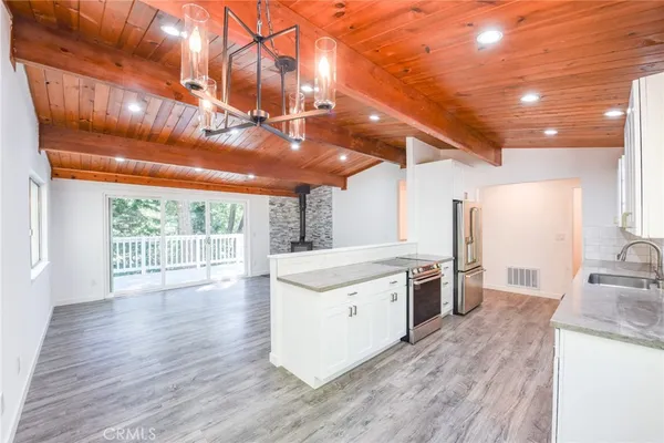 a view of kitchen with furniture and window