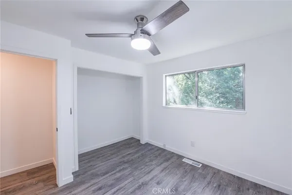 a view of staircase with white walls
