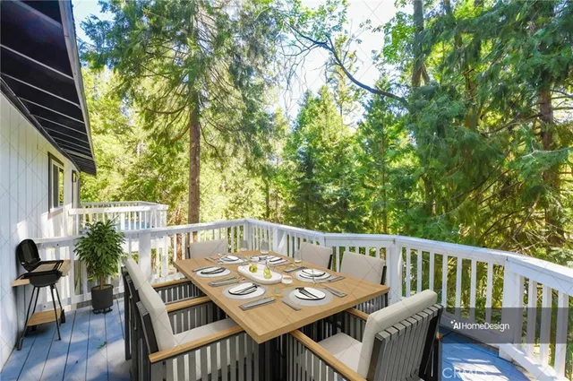 a view of balcony with wooden floor