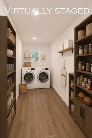 a kitchen with granite countertop a sink a counter space appliances and cabinets