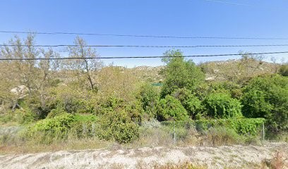 a view of a swimming pool and a yard