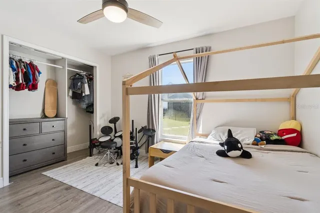 a view of a livingroom with furniture workspace and a window