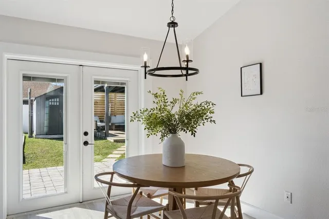 a vase of flowers sitting on a table