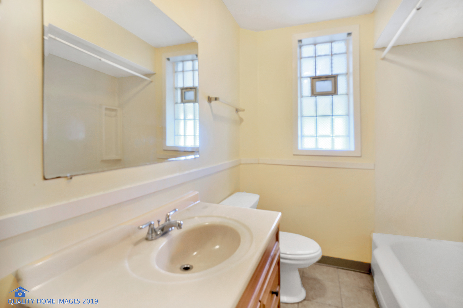 9733 South Charles Street Chicago, IL 60643 - Photo 11 of 26 a bathroom with a sink toilet and shower
