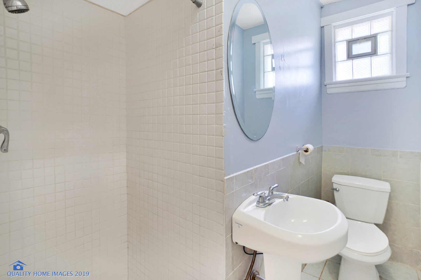 9733 South Charles Street Chicago, IL 60643 - Photo 17 of 26 a bathroom with a sink a toilet and mirror
