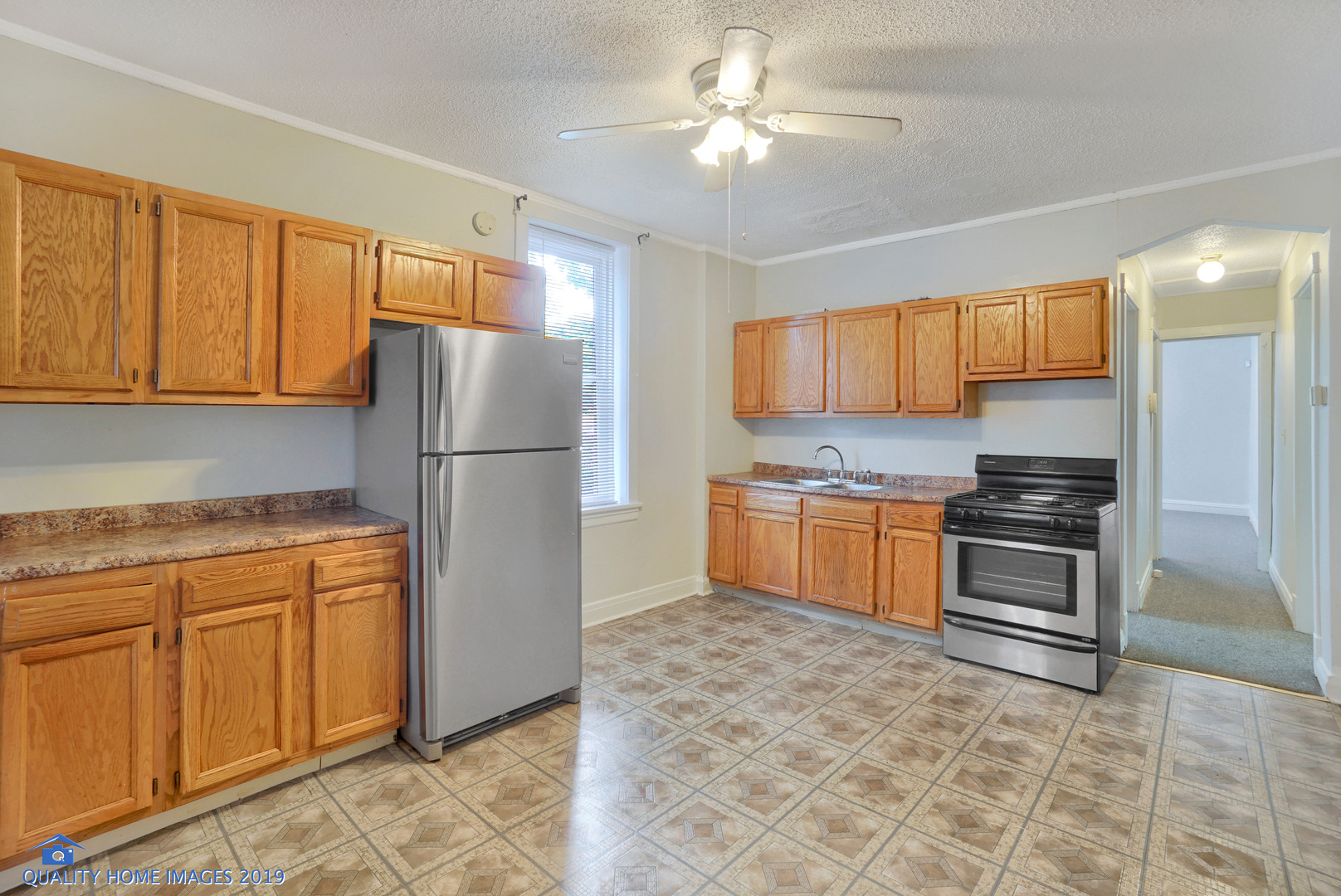 9733 South Charles Street Chicago, IL 60643 - Photo 18 of 26 a kitchen with stainless steel appliances granite countertop a refrigerator stove and sink