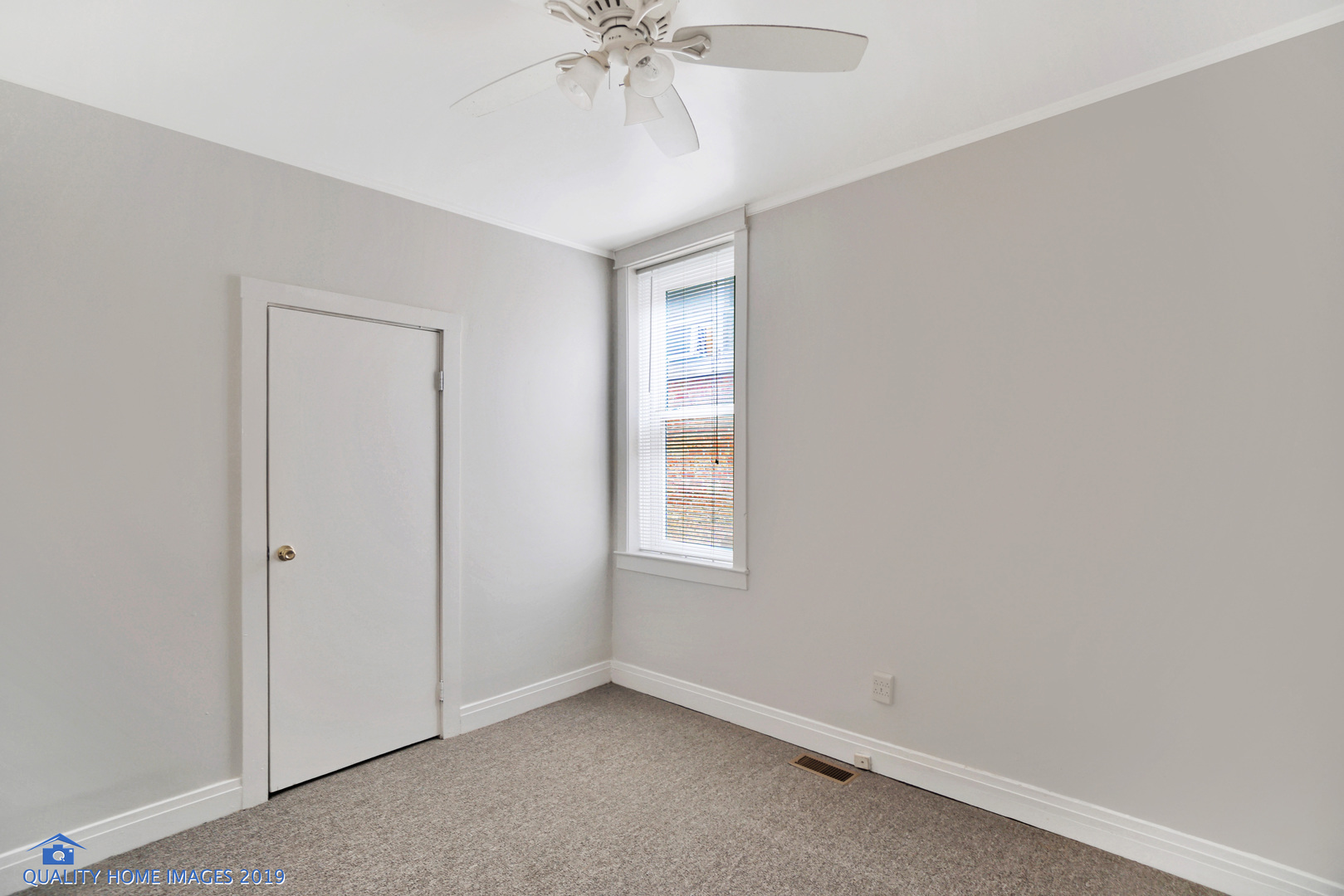 9733 South Charles Street Chicago, IL 60643 - Photo 21 of 26 an empty room with windows and fan