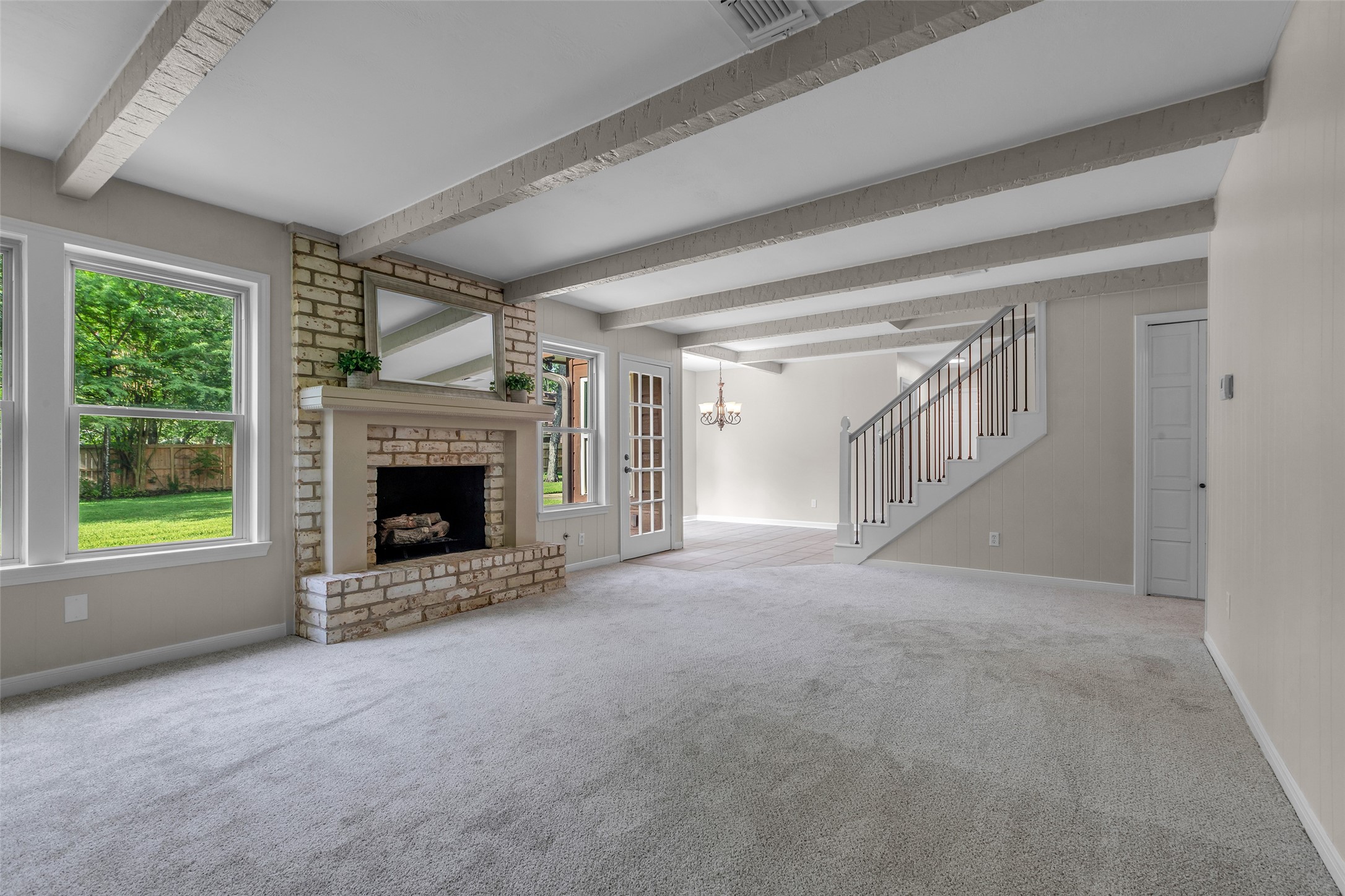 6415 Bayonne Drive Spring, TX 77389 - Photo 16 of 40 a view of empty room with a fireplace