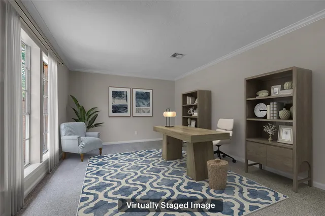 a living room with furniture and a table