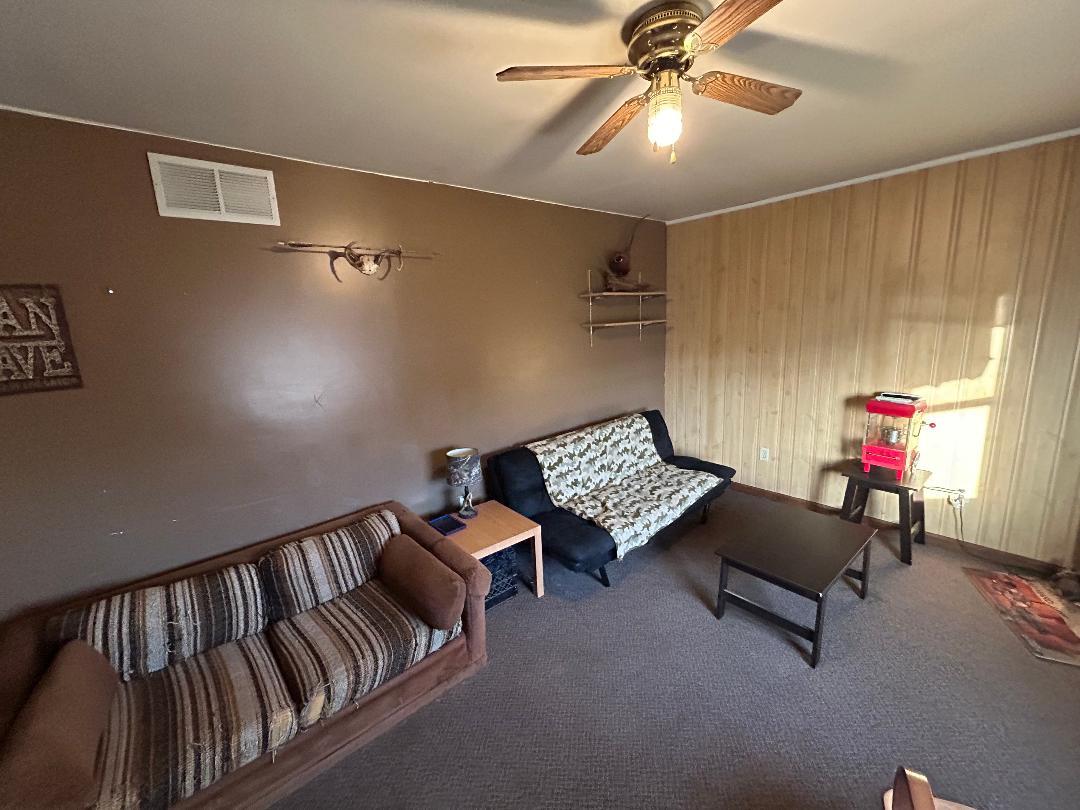 10598 North 3500W Road Manteno, IL 60950 - Photo 21 of 56 a bedroom with furniture and a ceiling fan