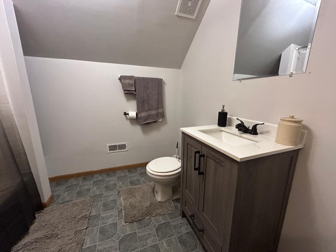 10598 North 3500W Road Manteno, IL 60950 - Photo 37 of 56 a bathroom with a sink and a toilet
