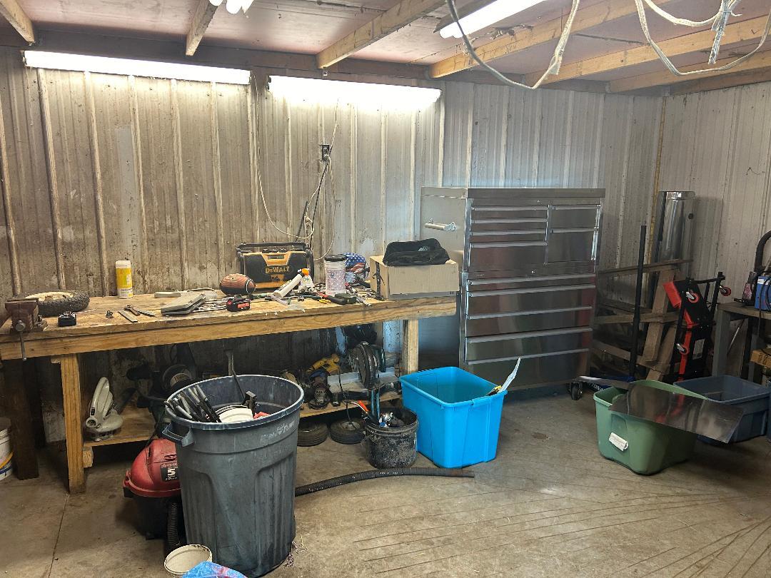 10598 North 3500W Road Manteno, IL 60950 - Photo 52 of 56 a room with water heater and racks