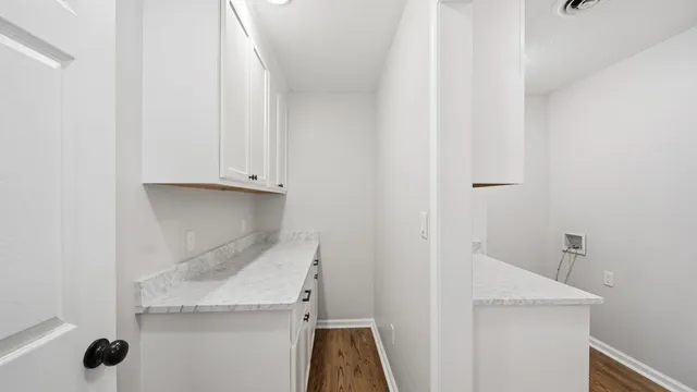 a bathroom with a sink and vanity