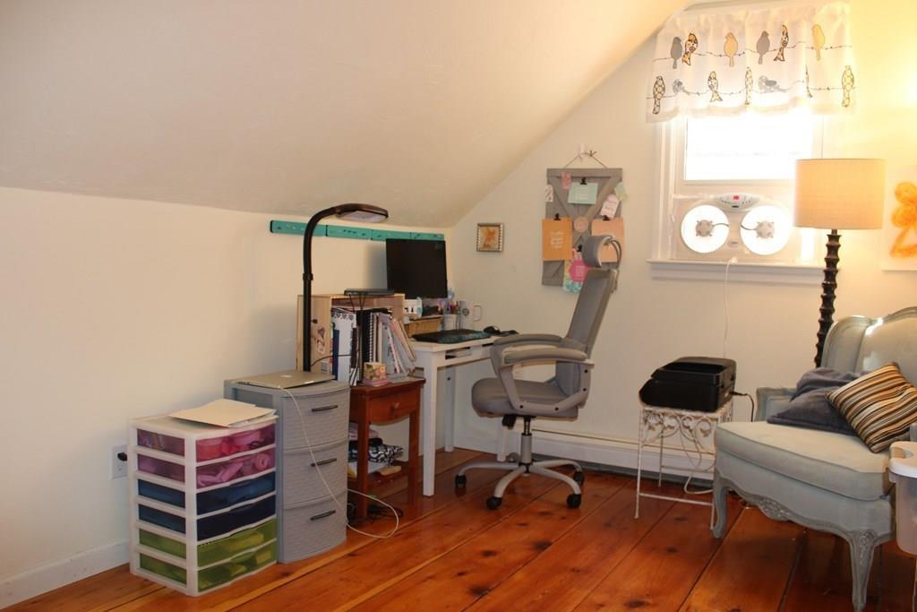 63 Grove Street Upton, MA 01568 - Photo 23 of 42 a view of a workspace with furniture and a window
