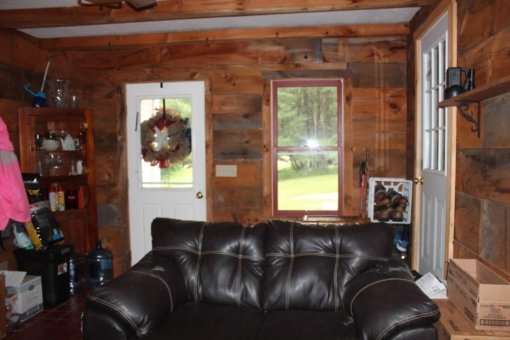 63 Grove Street Upton, MA 01568 - Photo 26 of 42 a living room with furniture and a window