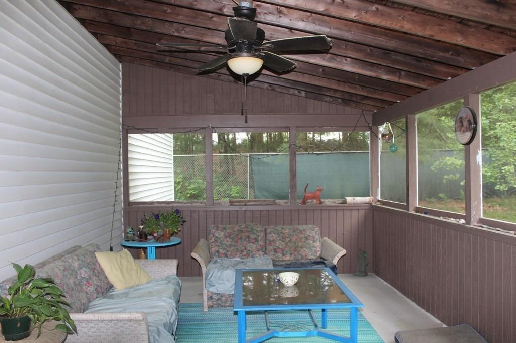 63 Grove Street Upton, MA 01568 - Photo 28 of 42 a outdoor living space with furniture and a potted plant