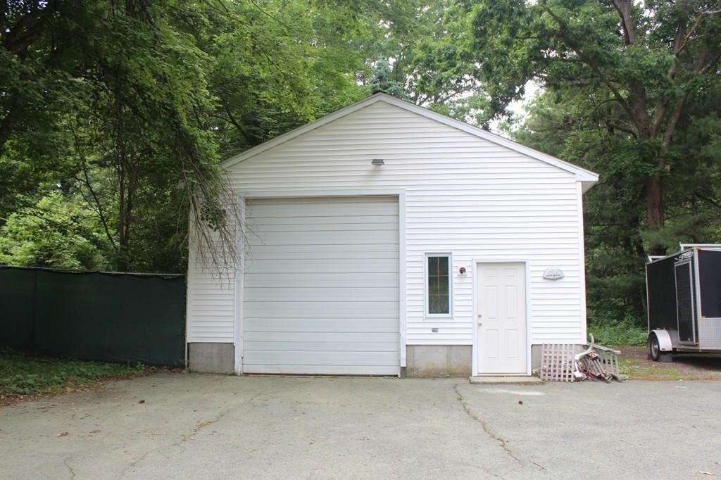 63 Grove Street Upton, MA 01568 - Photo 38 of 42 a view of a house with a yard