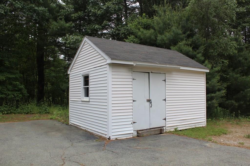63 Grove Street Upton, MA 01568 - Photo 42 of 42 a view of a house with a backyard