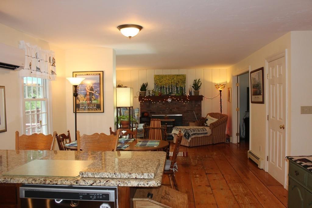 63 Grove Street Upton, MA 01568 - Photo 6 of 42 a view of a dining room with furniture