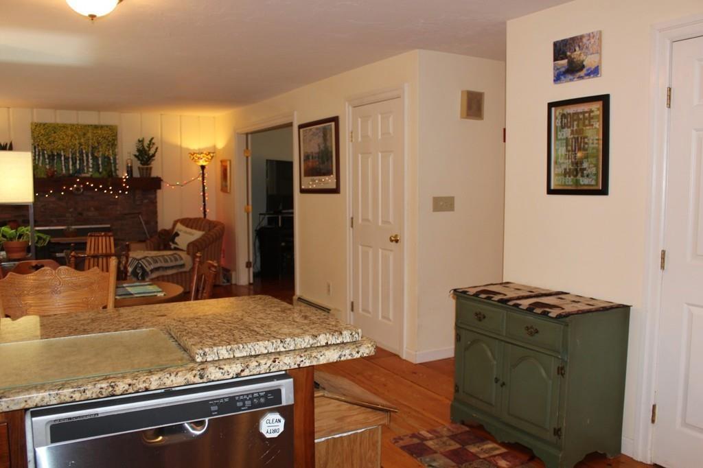 63 Grove Street Upton, MA 01568 - Photo 7 of 42 a kitchen with sink stove and refrigerator