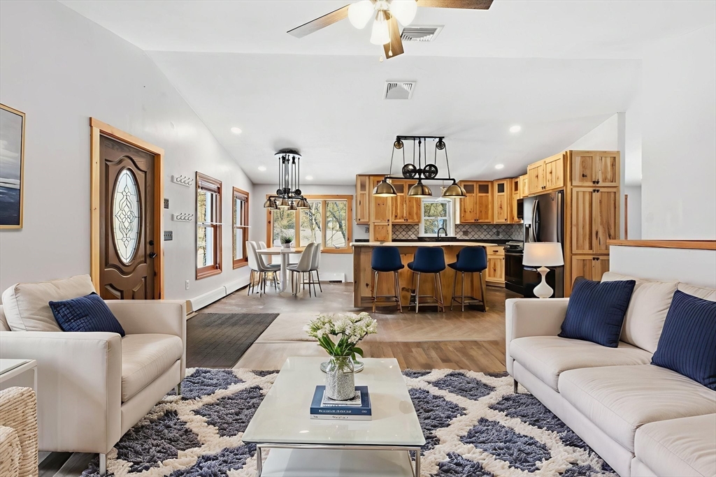 235 Crouch Road Warren, MA 01092 - Photo 11 of 42 a living room with furniture and wooden floor