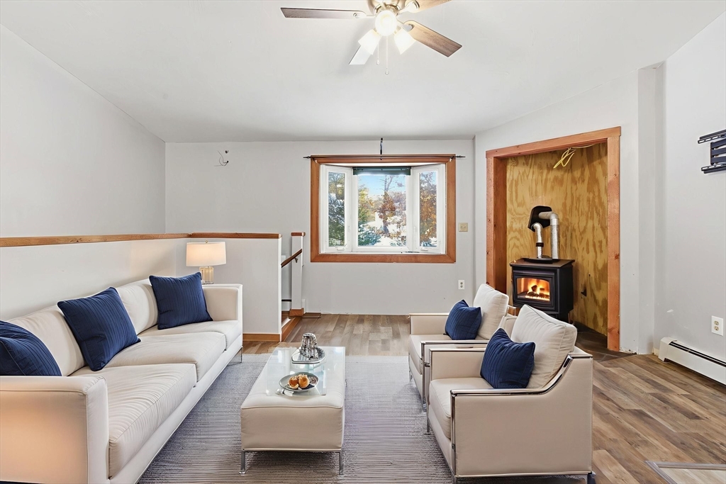 235 Crouch Road Warren, MA 01092 - Photo 15 of 42 a living room with furniture and a couch